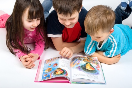 bigstockphoto_Children_With_Book_1198630